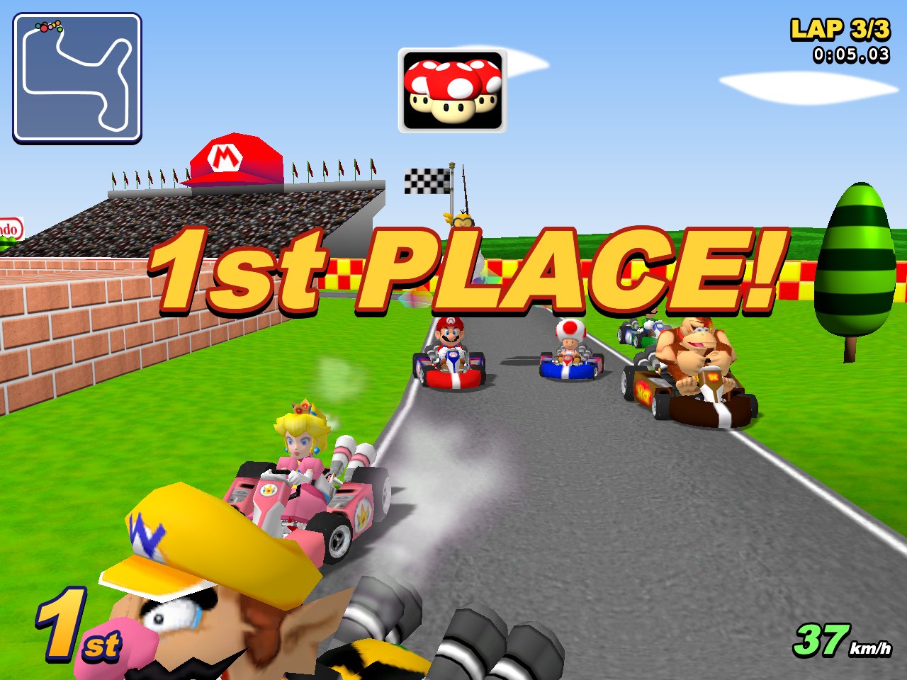 Survol après l'arrivée sur Mario Raceway : la caméra devant le kart 3D de Mario, tournée vers lui.